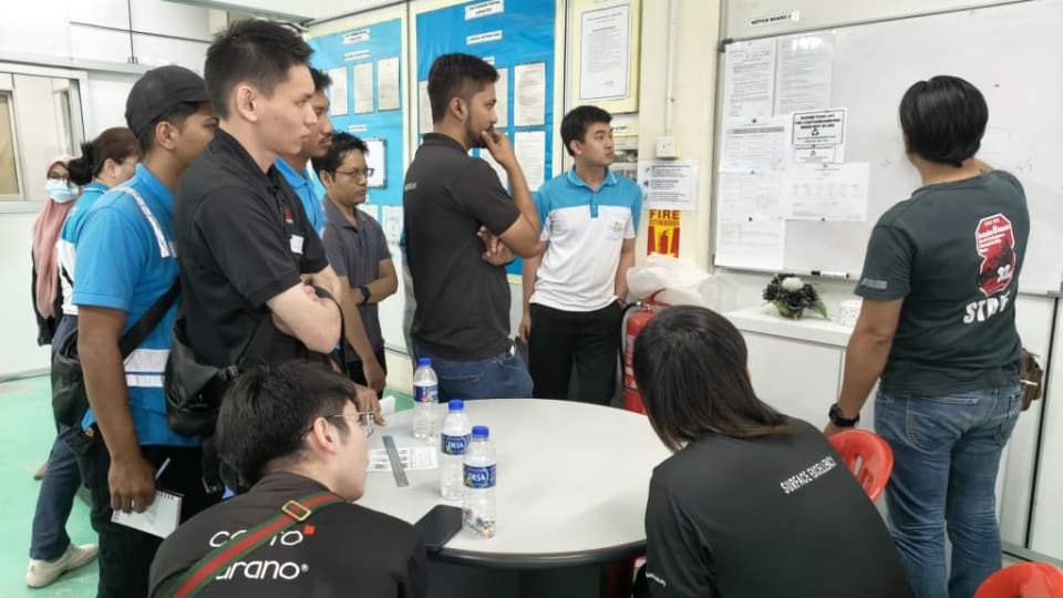 Clayton factory representative explaining production process